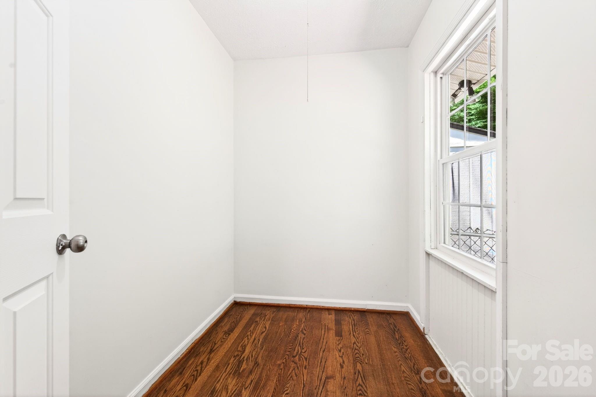 34 Wolfe Cove Road Asheville, NC 28804 - Photo 10 of 42 a view of a hallway with wooden floor