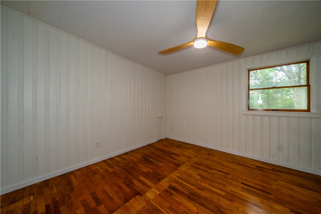 11296 Pansing Road Brookville, OH 45309 - Photo 26 of 53 This spacious room features hardwood flooring and abundant natural light through a large window.