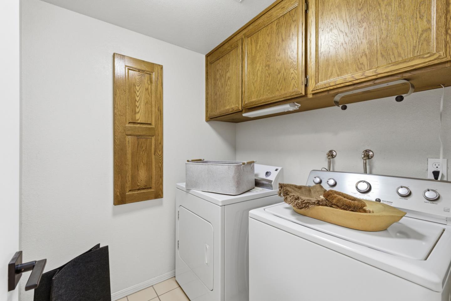 1669 Geary Road Walnut Creek, CA 94597 - Photo 27 of 39 a utility room with dryer and washer