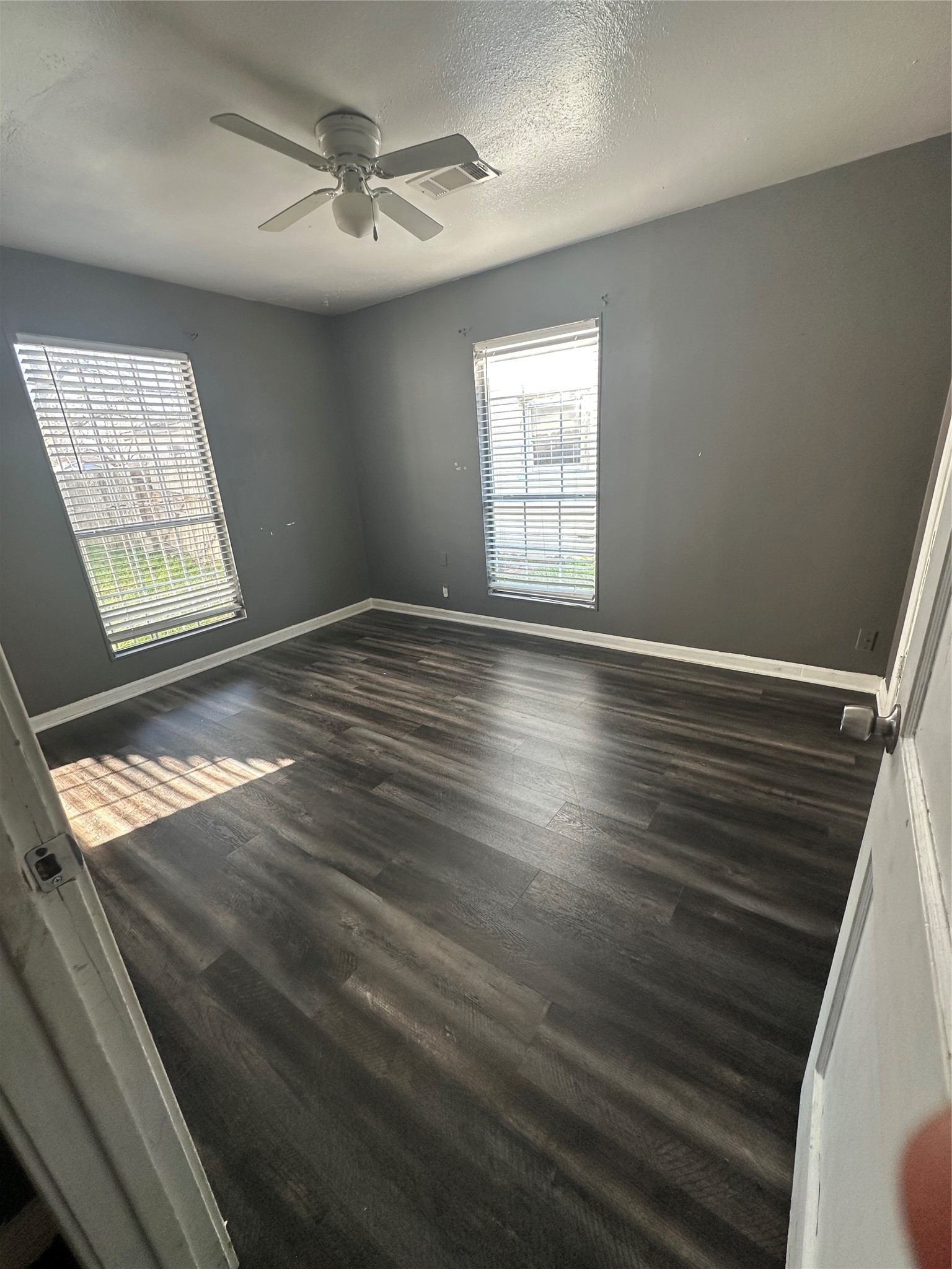 8214 Barkley Street Houston, TX 77017 - Photo 5 of 9 Bedroom 1 with wood-look flooring and natural light