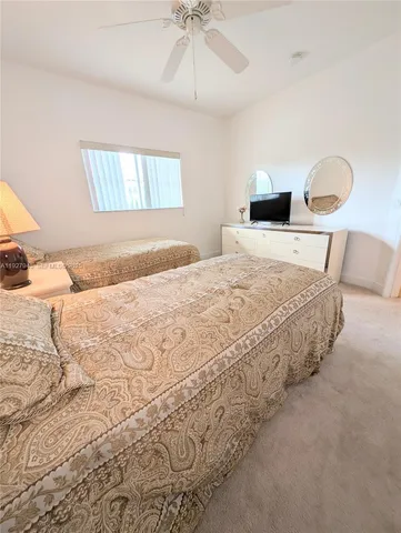 a view of a bathroom from a hallway