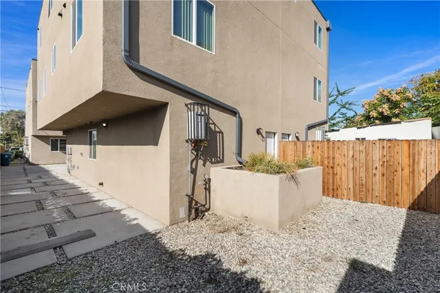 a view of a back yard of the house