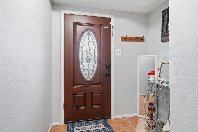 a view of storage and utility room with washer and dryer