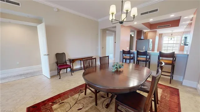 a view of a a dining room with furniture