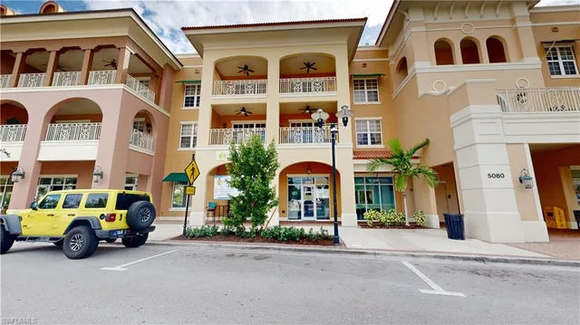 a view of balcony with wooden floor