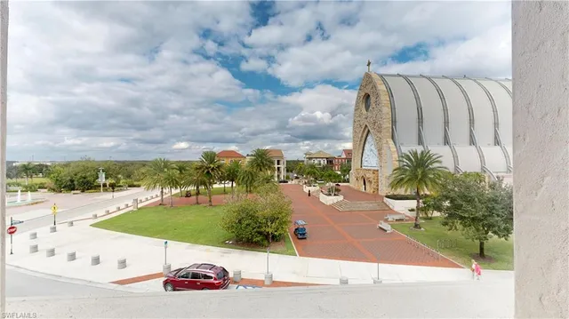 a view of a swimming pool with an outdoor space