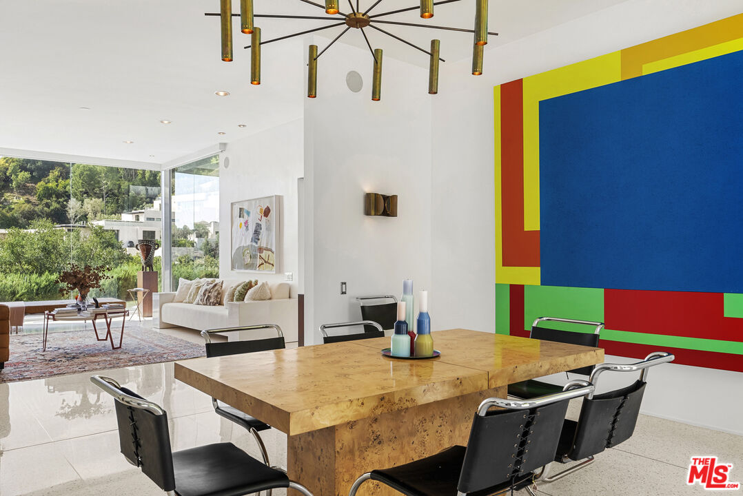 10899 Chalon Road Los Angeles, CA 90077 - Photo 14 of 34 a view of kitchen and dining area with furniture