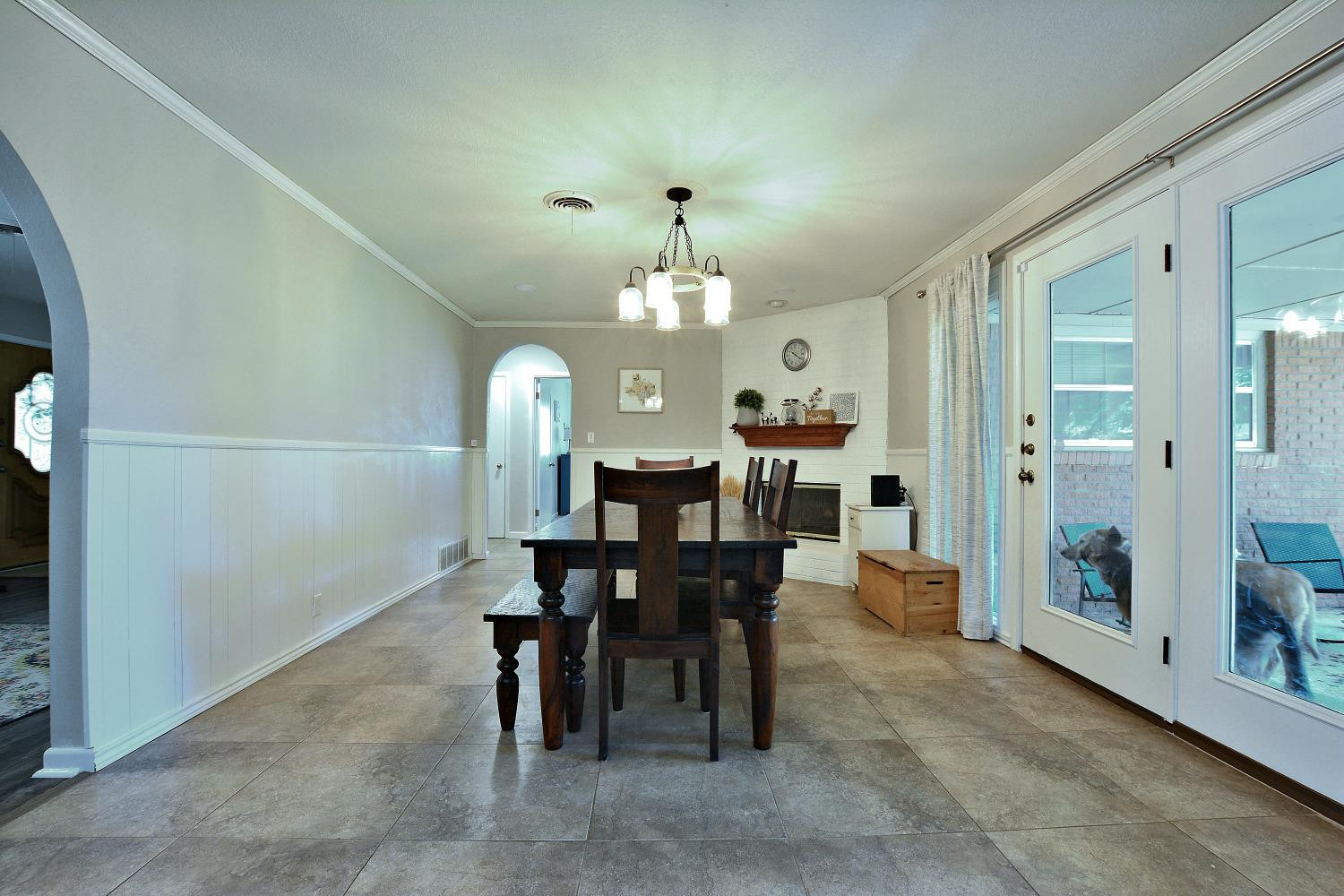 4903 17th Street Lubbock, TX 79416 - Photo 10 of 25 a view of a dining room with furniture and window