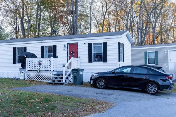 a car parked in front of a house