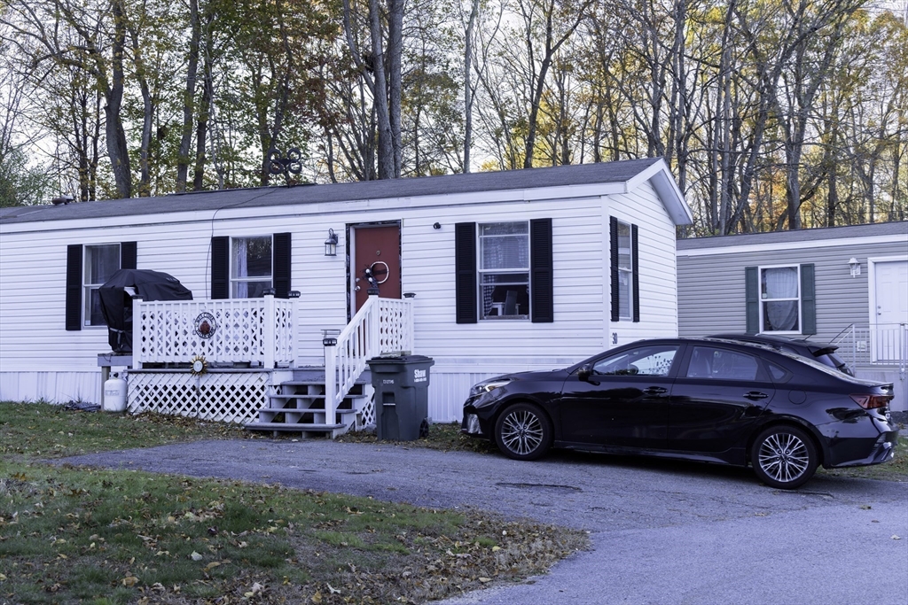 a car parked in front of a house