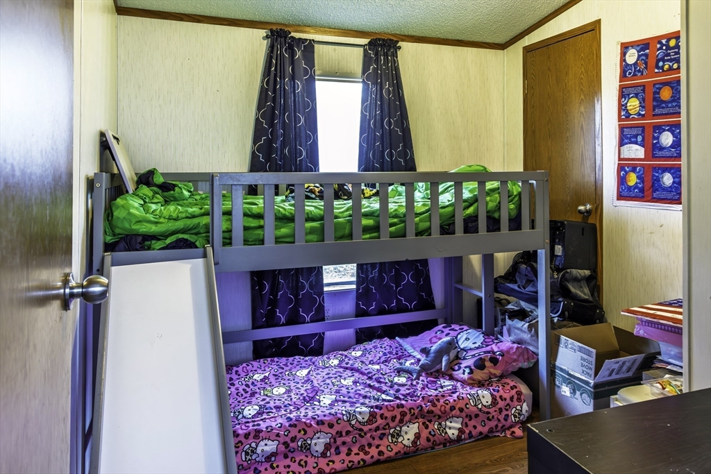 18 Maple Street, Unit 30 Pepperell, MA 01463 - Photo 6 of 19 view of living room with wooden floor