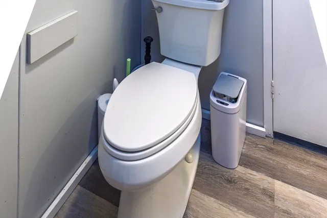 a close view of a toilet in a bathroom