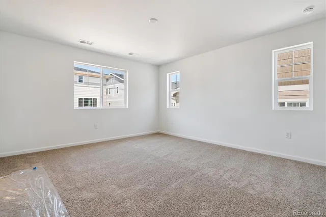 an empty room with windows