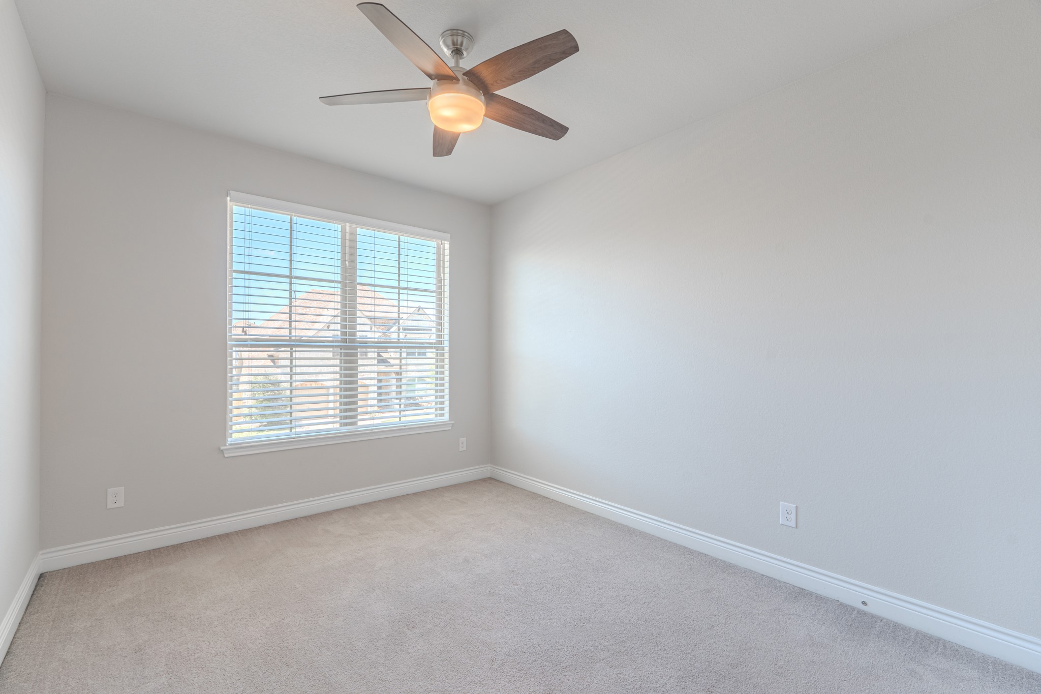 27918 Madison Bend Drive Spring, TX 77386 - Photo 42 of 50 an empty room with a window and a fan
