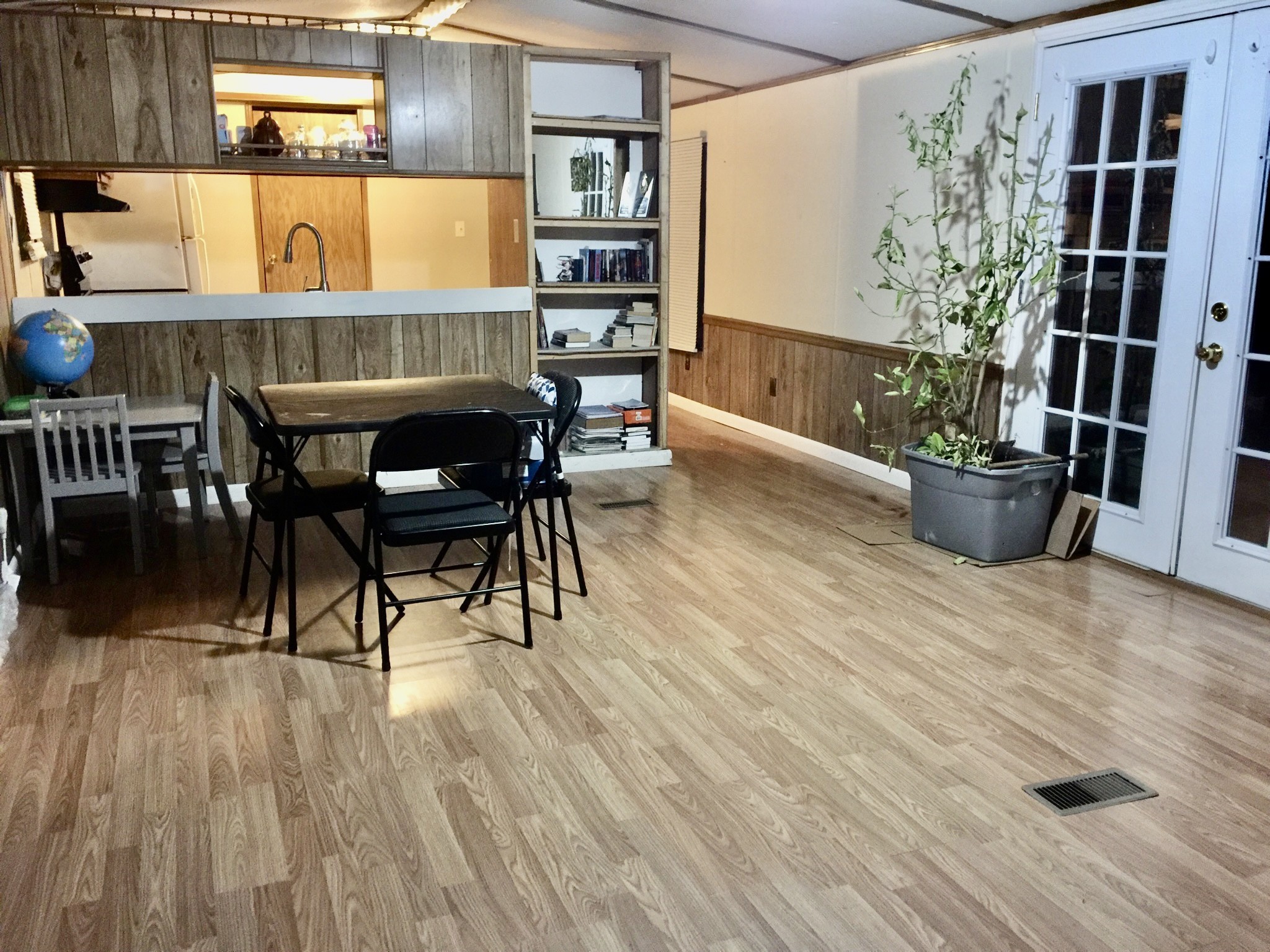 186 Keener Road Dunlap, TN 37327 - Photo 5 of 13 a view of a dining room with furniture and wooden floor