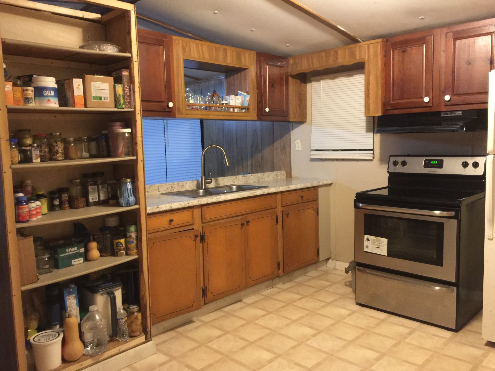 186 Keener Road Dunlap, TN 37327 - Photo 6 of 13 a kitchen with stainless steel appliances granite countertop a refrigerator a stove a sink and a microwave