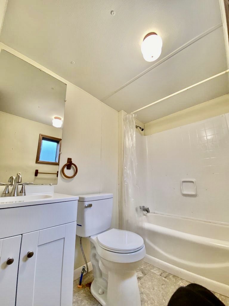 186 Keener Road Dunlap, TN 37327 - Photo 10 of 13 a bathroom with a sink a toilet and shower