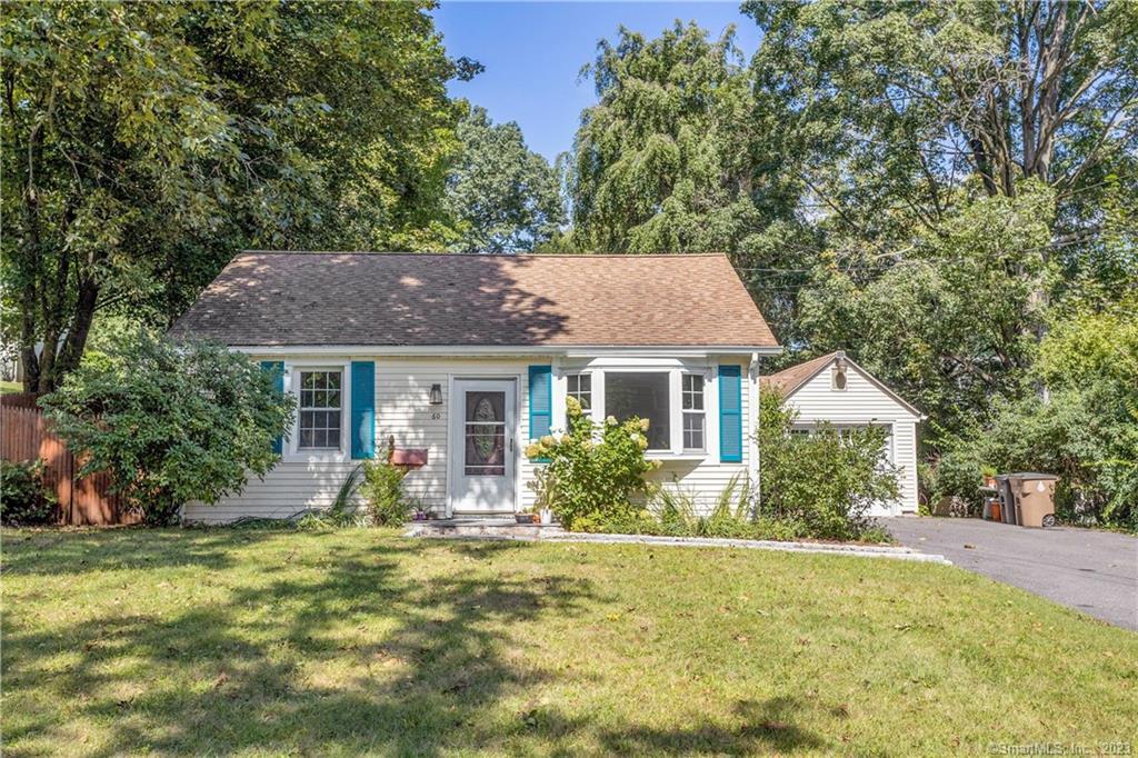 60 Knox Road Stamford, CT 06907 - Photo 1 of 1 a view of a house with a yard and plants