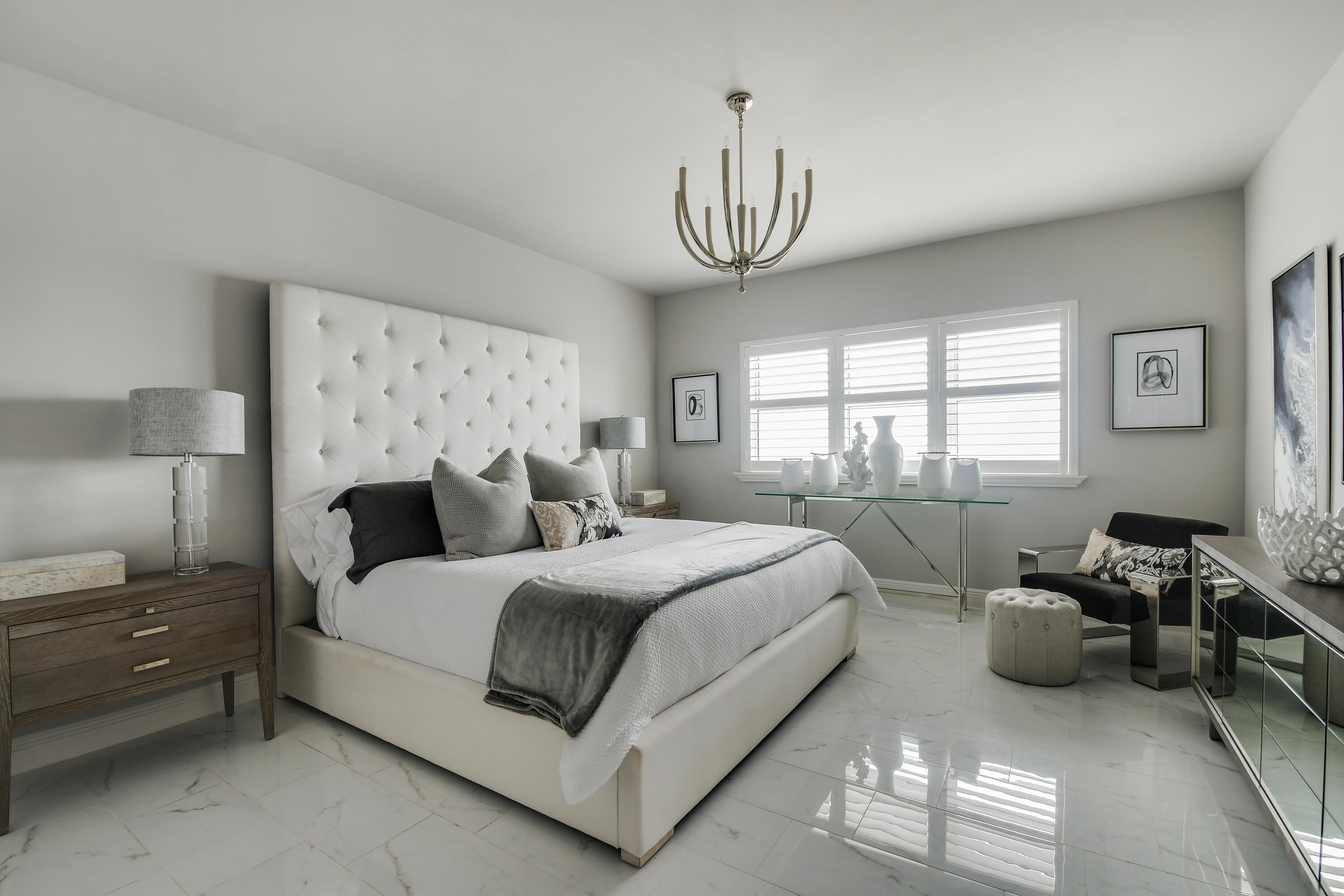 2650 Lake Shore Drive, Unit 1203 Riviera Beach, FL 33404 - Photo 12 of 17 a bedroom with bed and a window