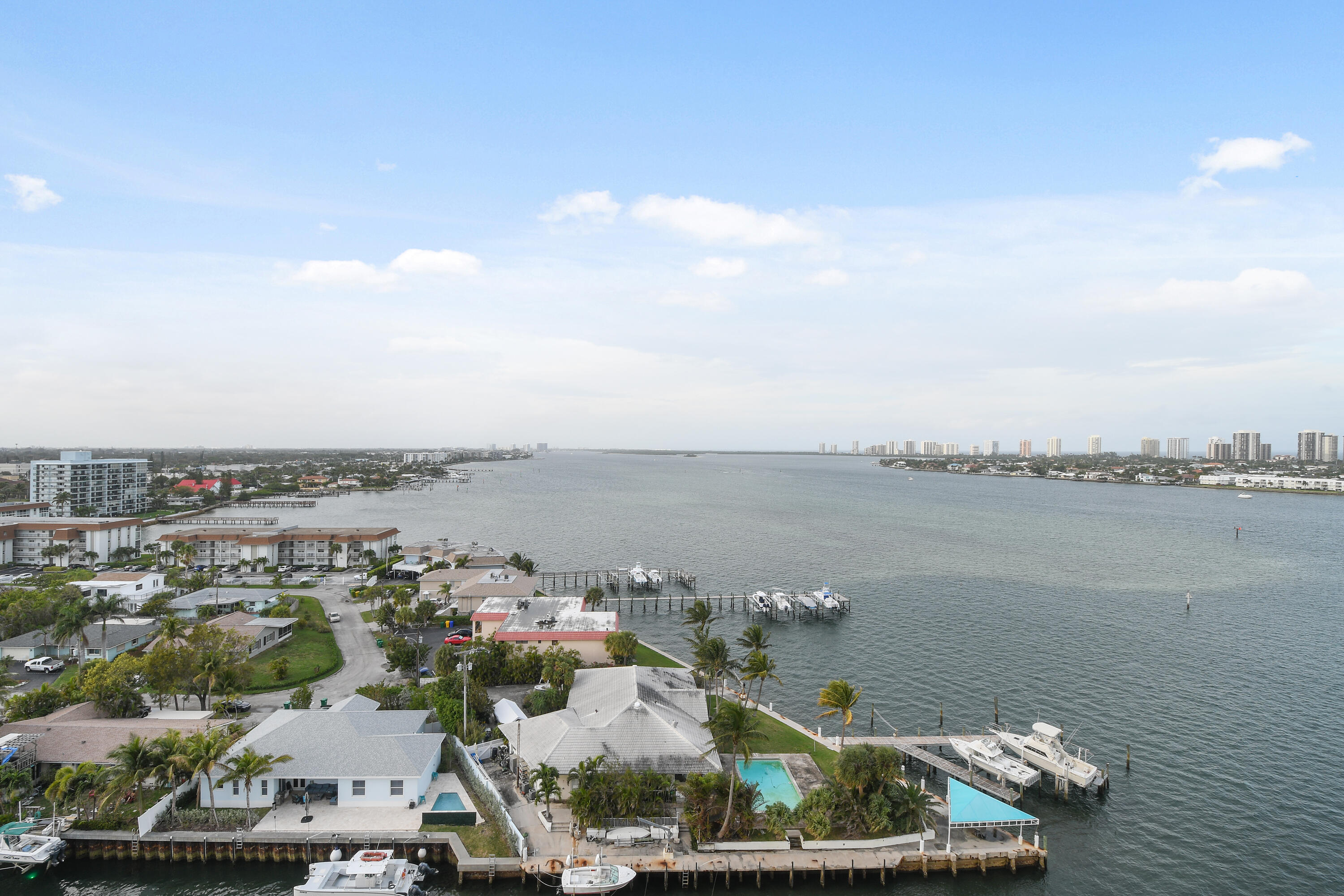 2650 Lake Shore Drive, Unit 1203 Riviera Beach, FL 33404 - Photo 17 of 17 a view of a lake and mountain