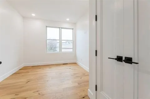a view of an empty room and window