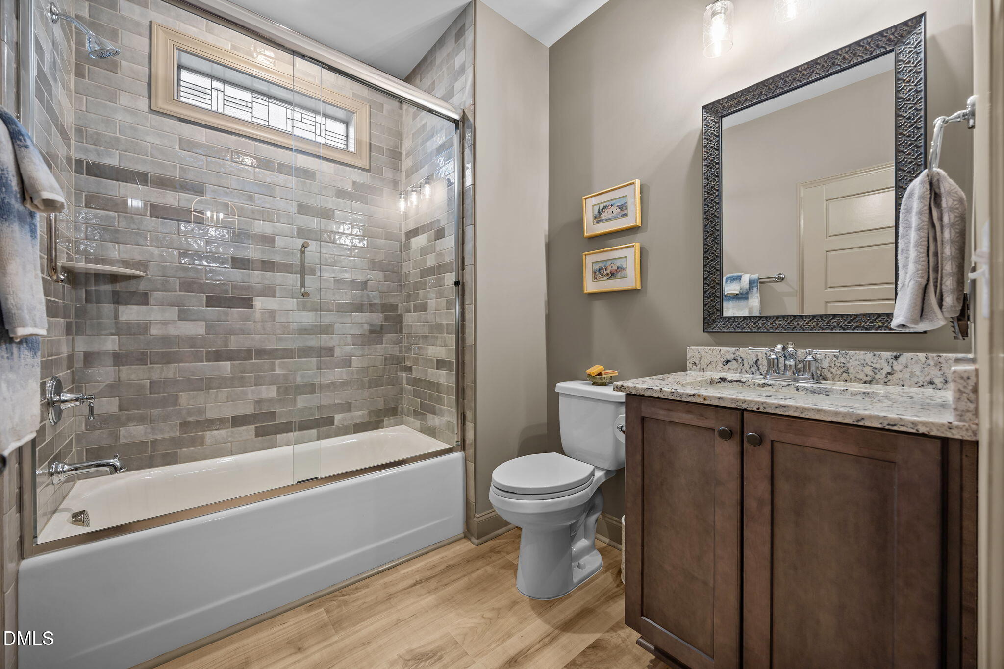 1748 Deacon Fls Way Wendell, NC 27591 - Photo 17 of 51 a bathroom with a sink and a mirror