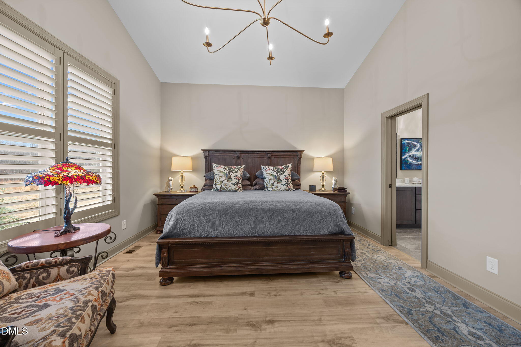 1748 Deacon Fls Way Wendell, NC 27591 - Photo 27 of 51 a bedroom with a bed and a potted plant