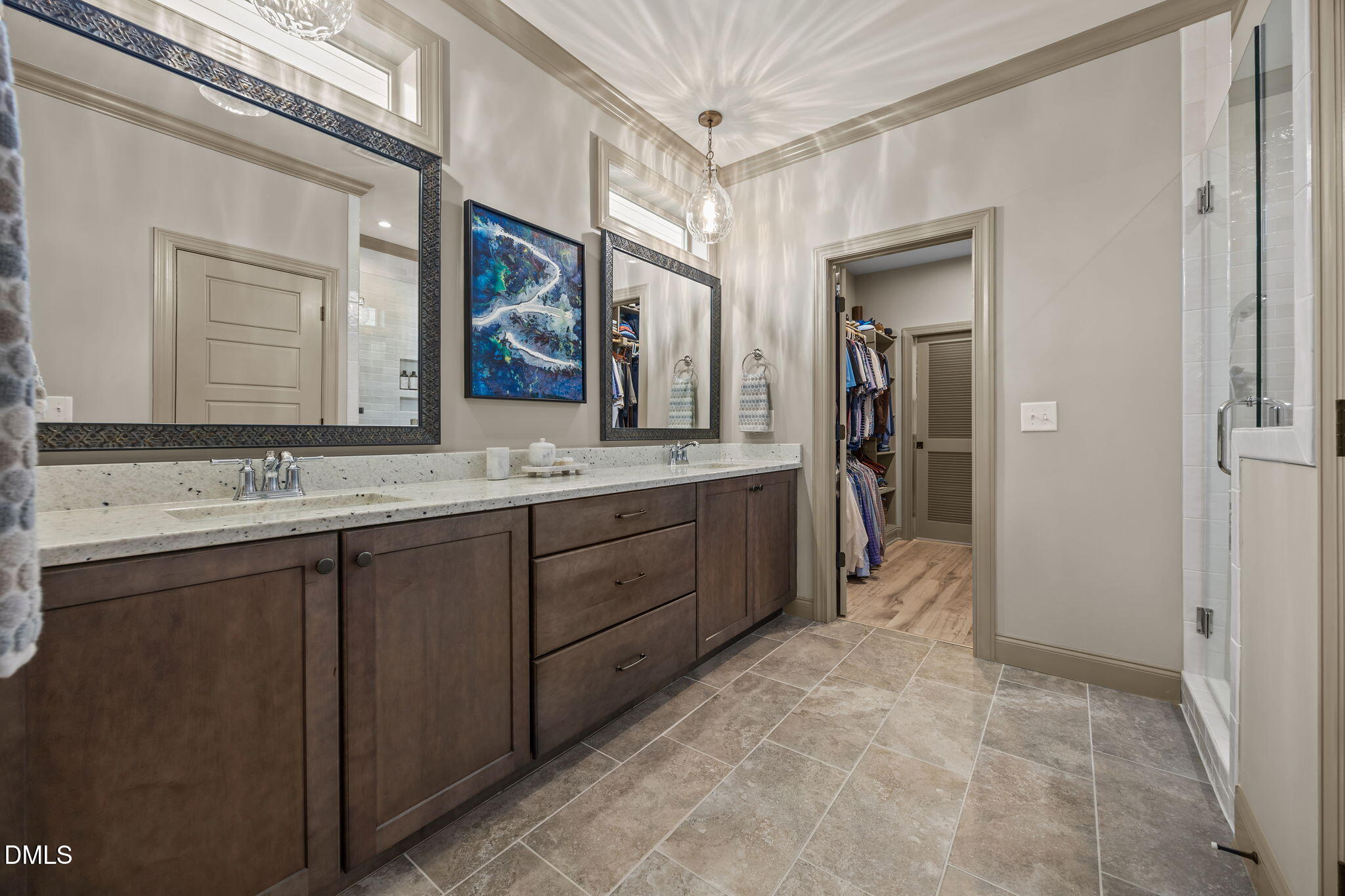 1748 Deacon Fls Way Wendell, NC 27591 - Photo 28 of 51 a spacious bathroom with a double vanity sink and a mirror