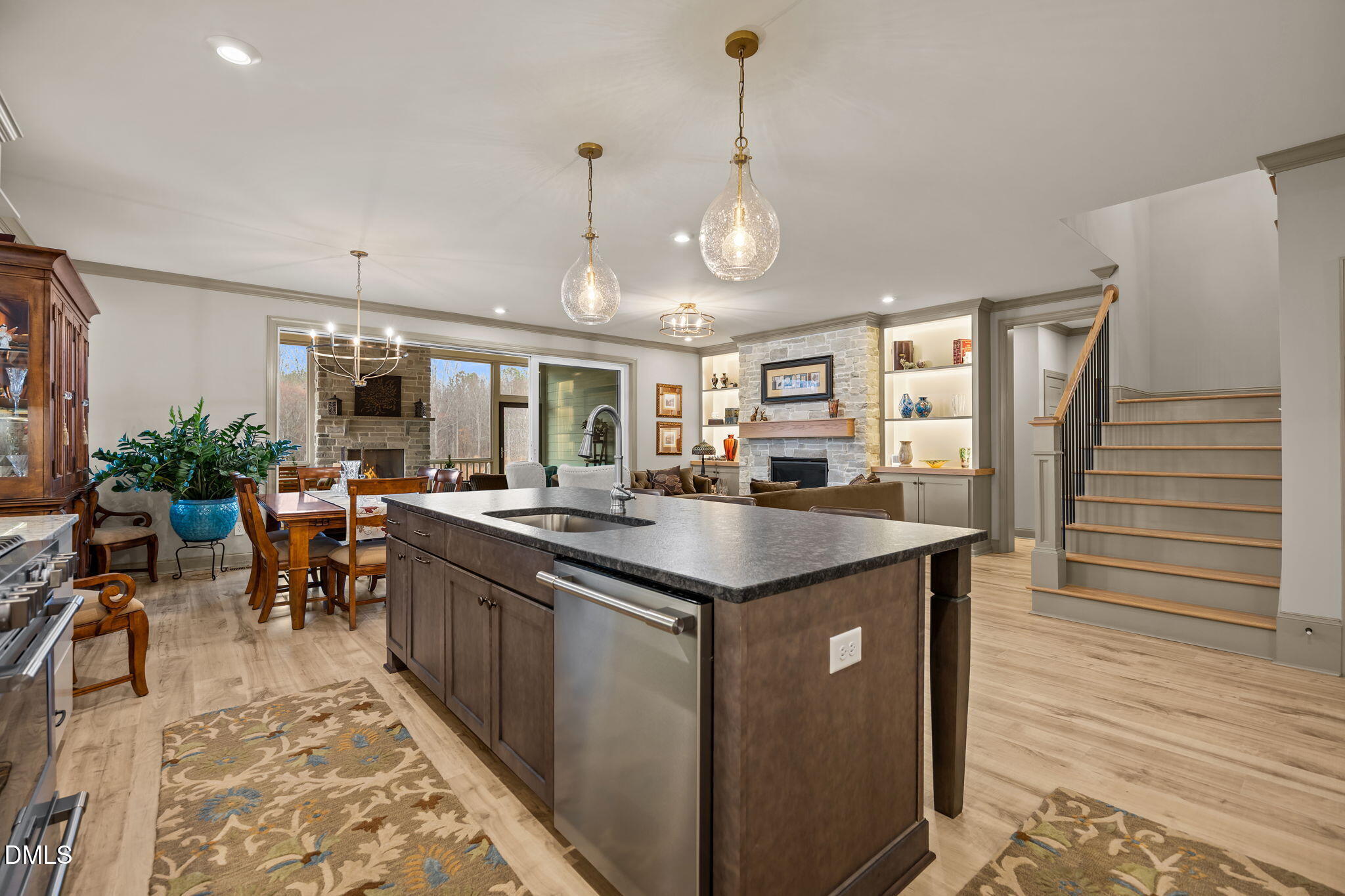 1748 Deacon Fls Way Wendell, NC 27591 - Photo 3 of 51 a kitchen with lots of counter space and wooden floor