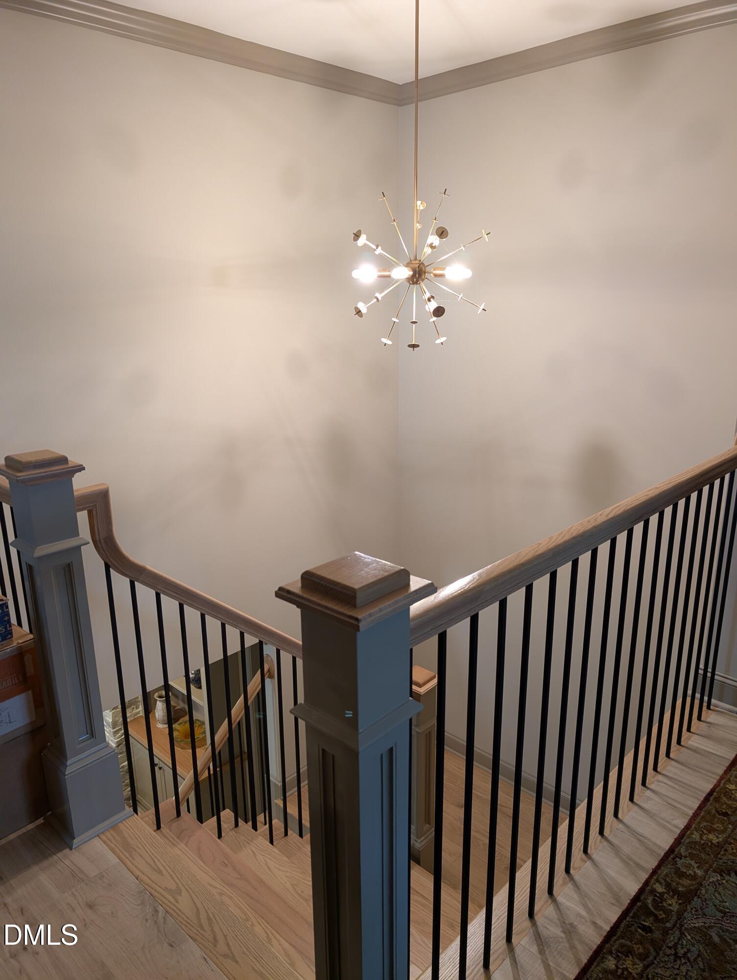 1748 Deacon Fls Way Wendell, NC 27591 - Photo 32 of 51 a view of a hallway with wooden floor