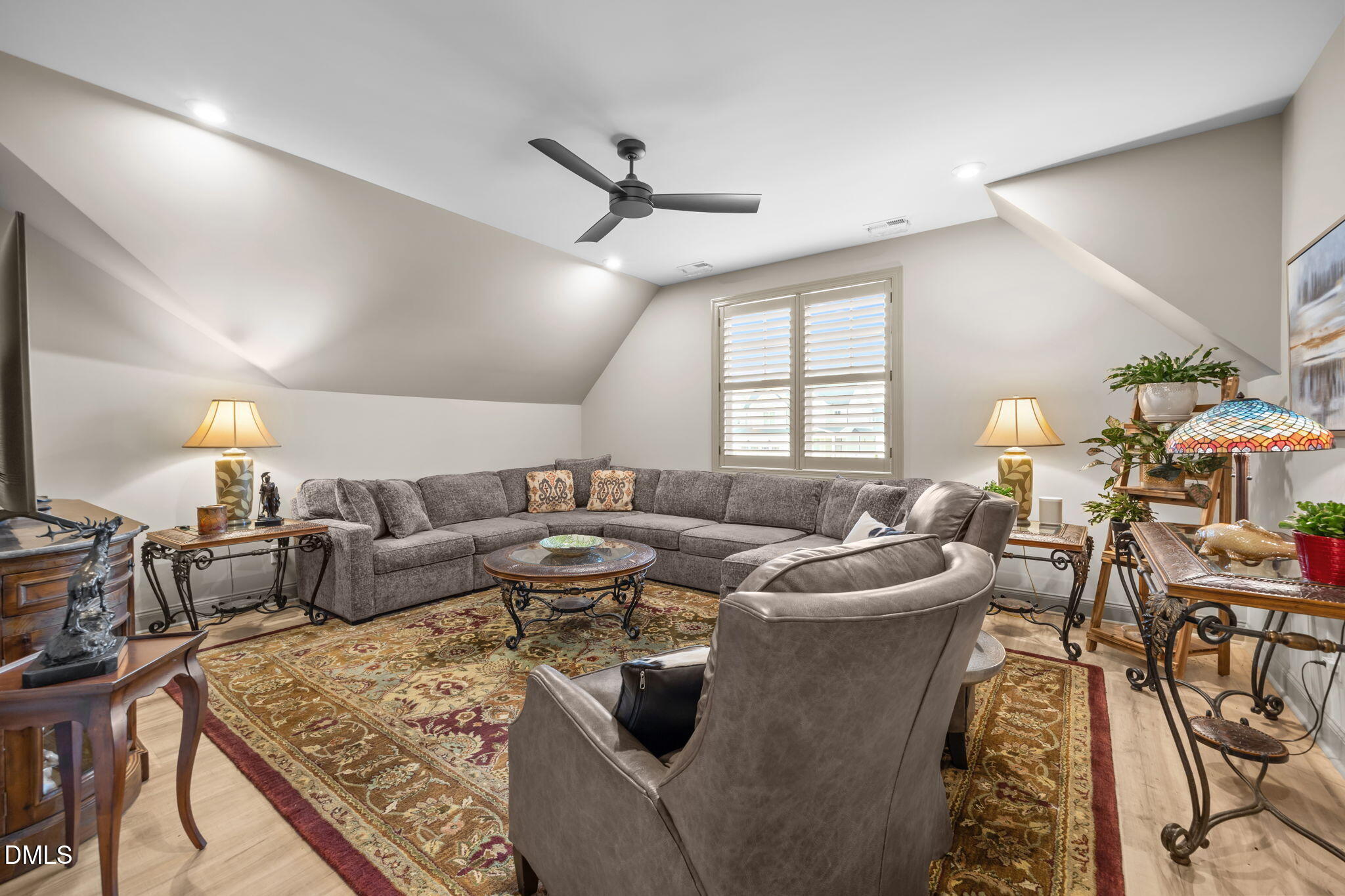 1748 Deacon Fls Way Wendell, NC 27591 - Photo 34 of 51 a living room with furniture and wooden floor