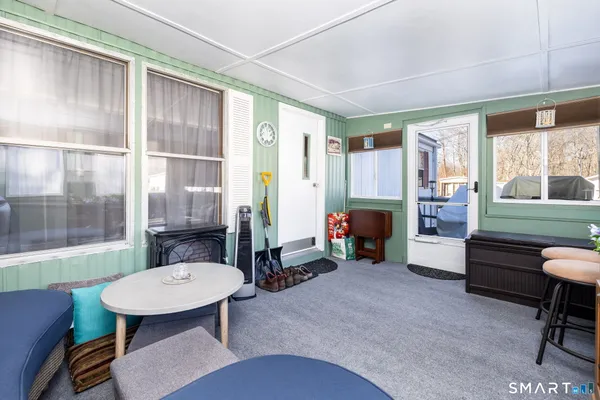 a room with furniture and a window