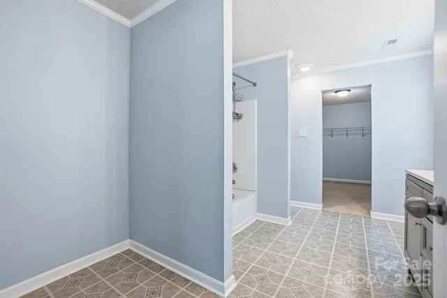 a bathroom with a sink a vanity and a mirror