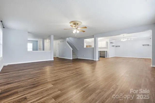 a view of a livingroom with wooden floor