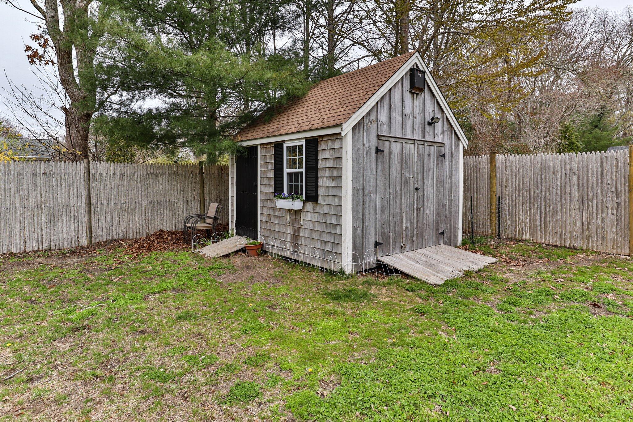 159 Sheaffer Road Centerville, MA 02632 - Photo 29 of 29 a view of a back yard of the house