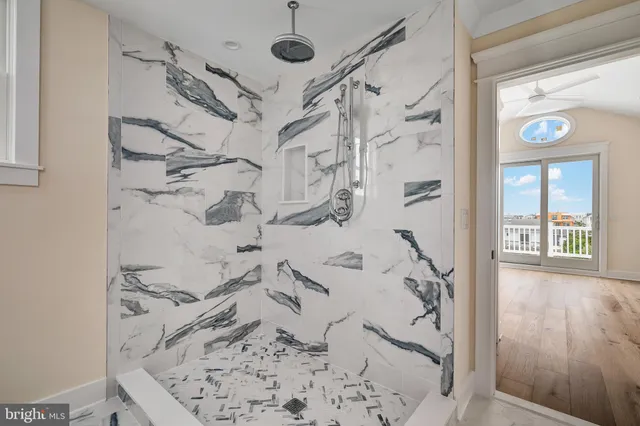 a picture of a bathroom with a shower curtain