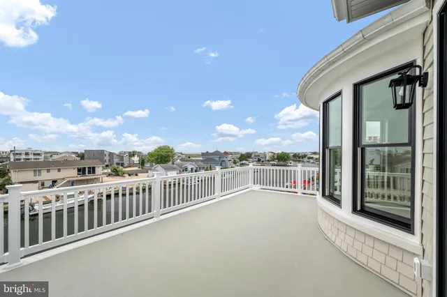 a view of a balcony with city view