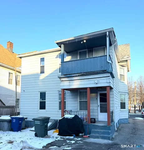 a car parked in front of a house