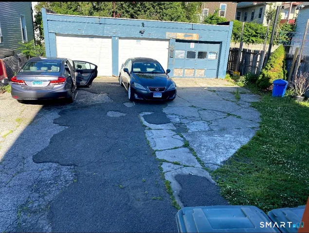 a view of a backyard of the house