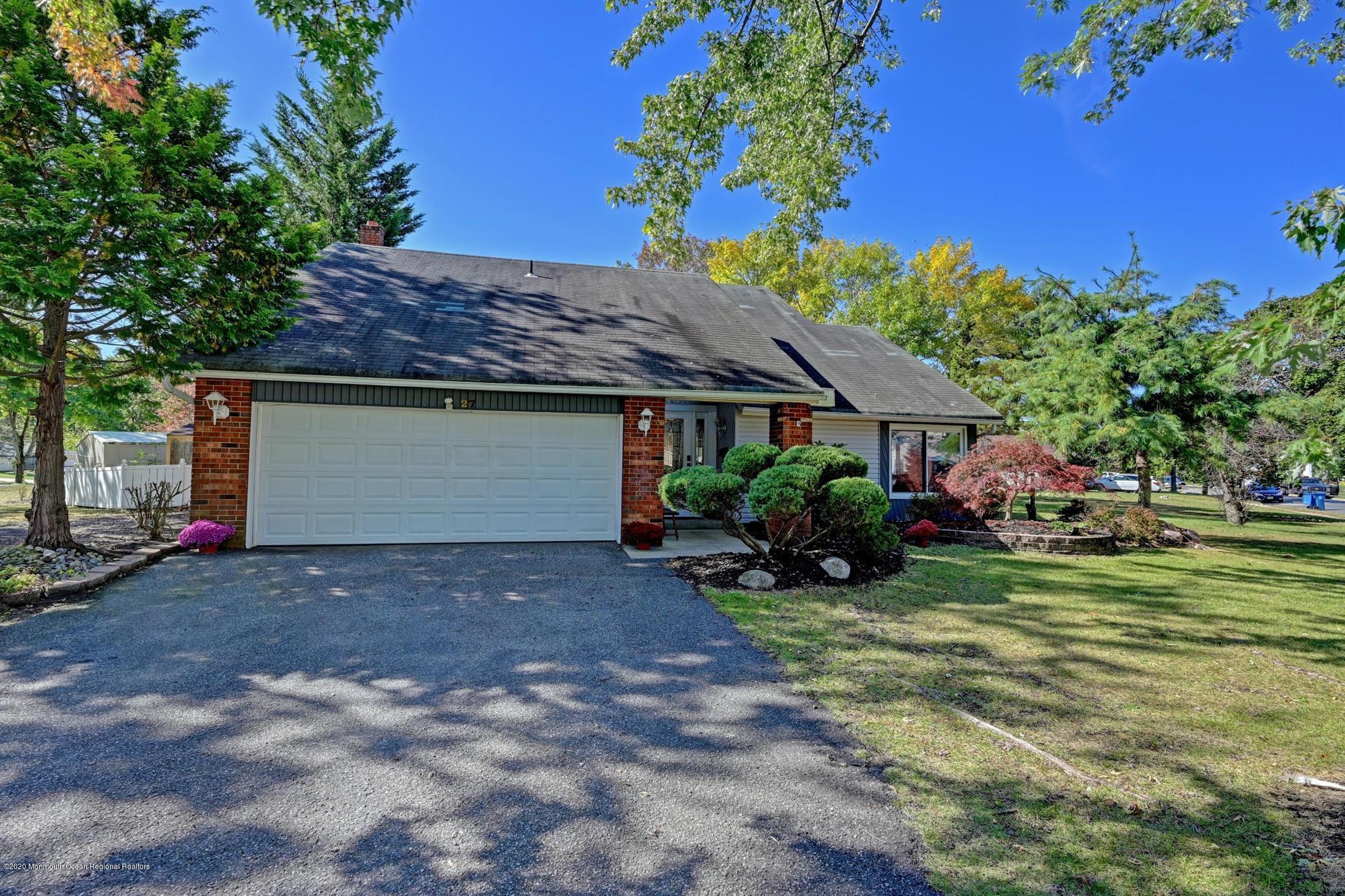 27 Sugar Bush Road Howell, NJ 07731 - Photo 3 of 46 a view of a house with a yard and sitting area