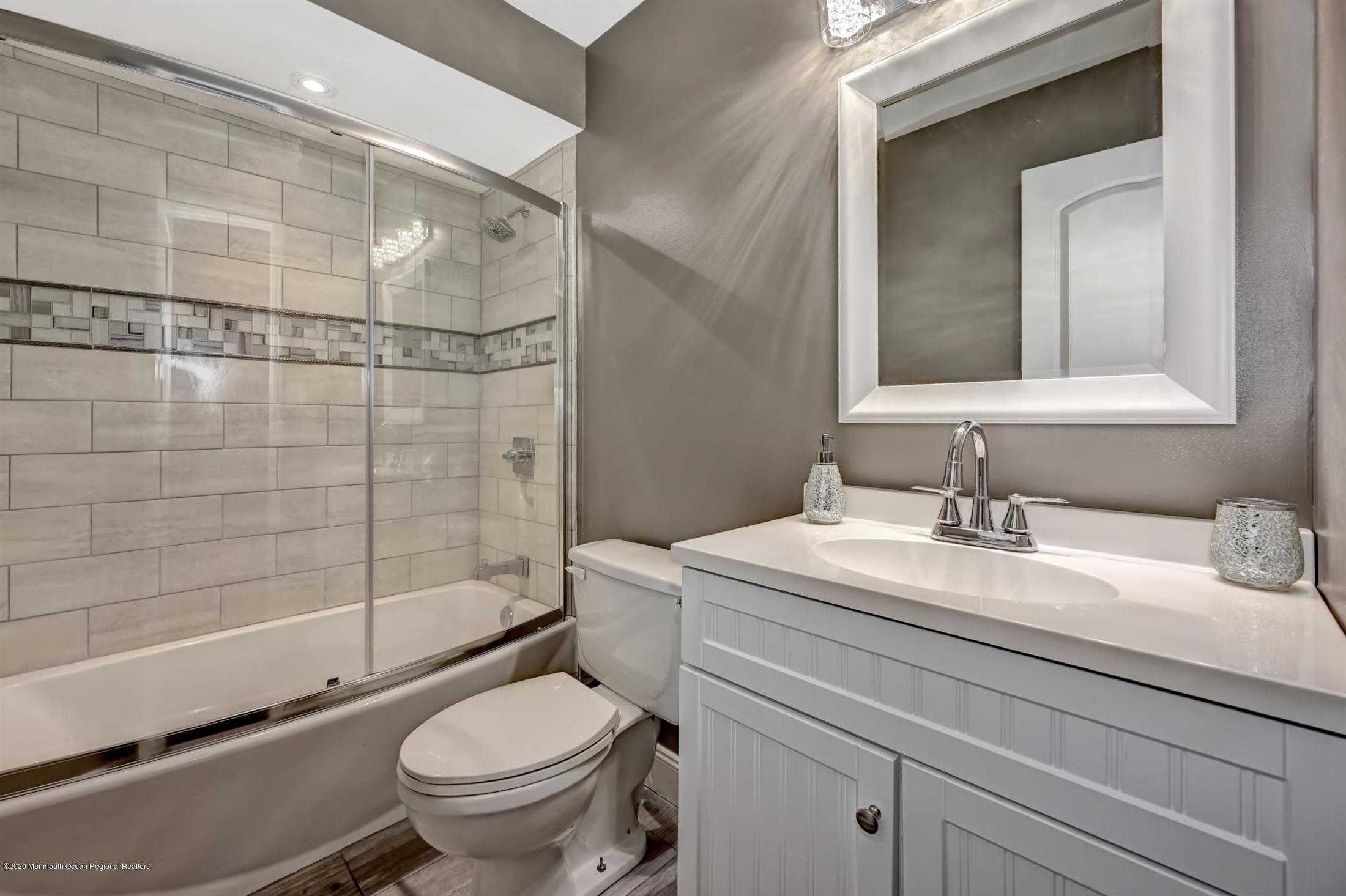 27 Sugar Bush Road Howell, NJ 07731 - Photo 34 of 46 a bathroom with a sink toilet and shower