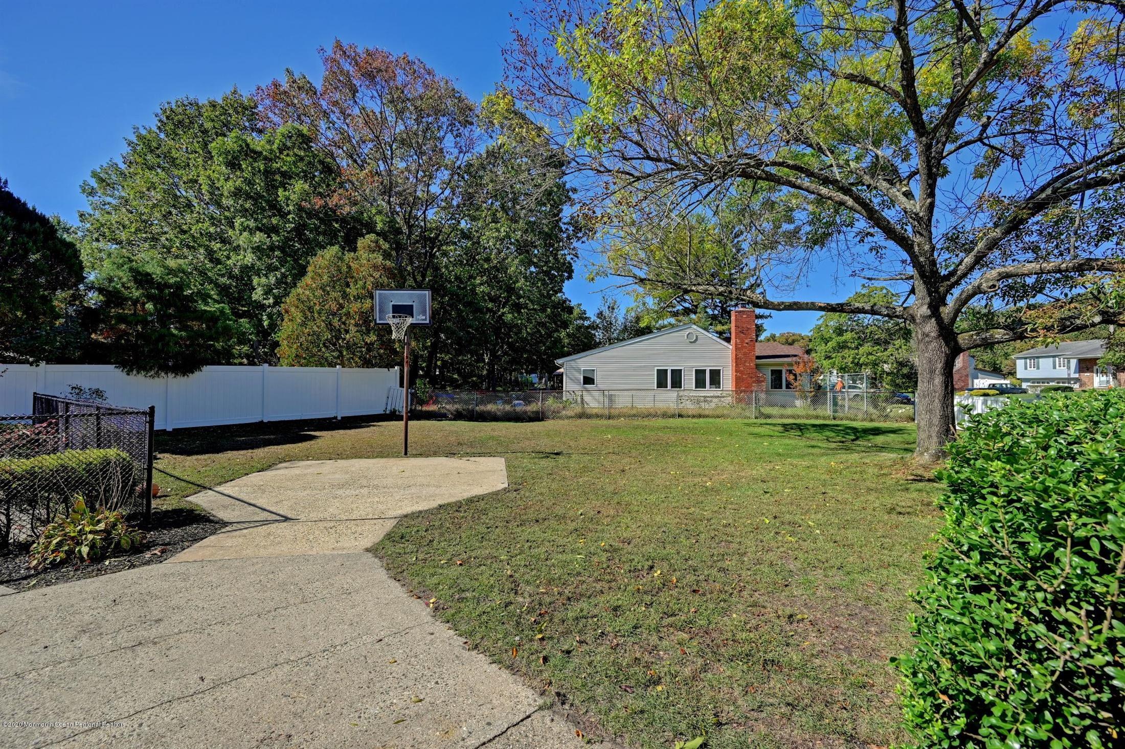 27 Sugar Bush Road Howell, NJ 07731 - Photo 40 of 46 a house view with a outdoor space