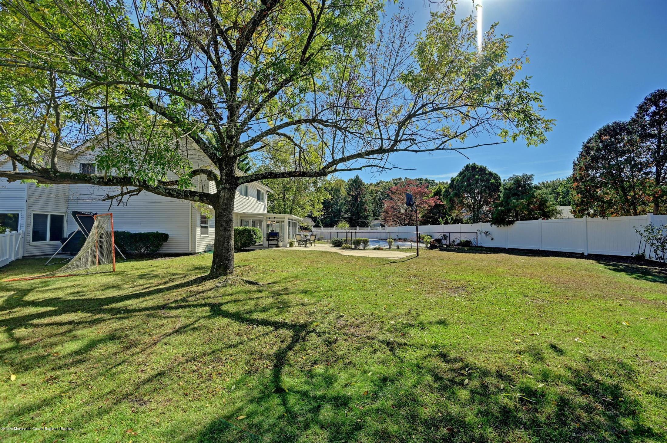 27 Sugar Bush Road Howell, NJ 07731 - Photo 41 of 46 a view of swimming pool with a yard