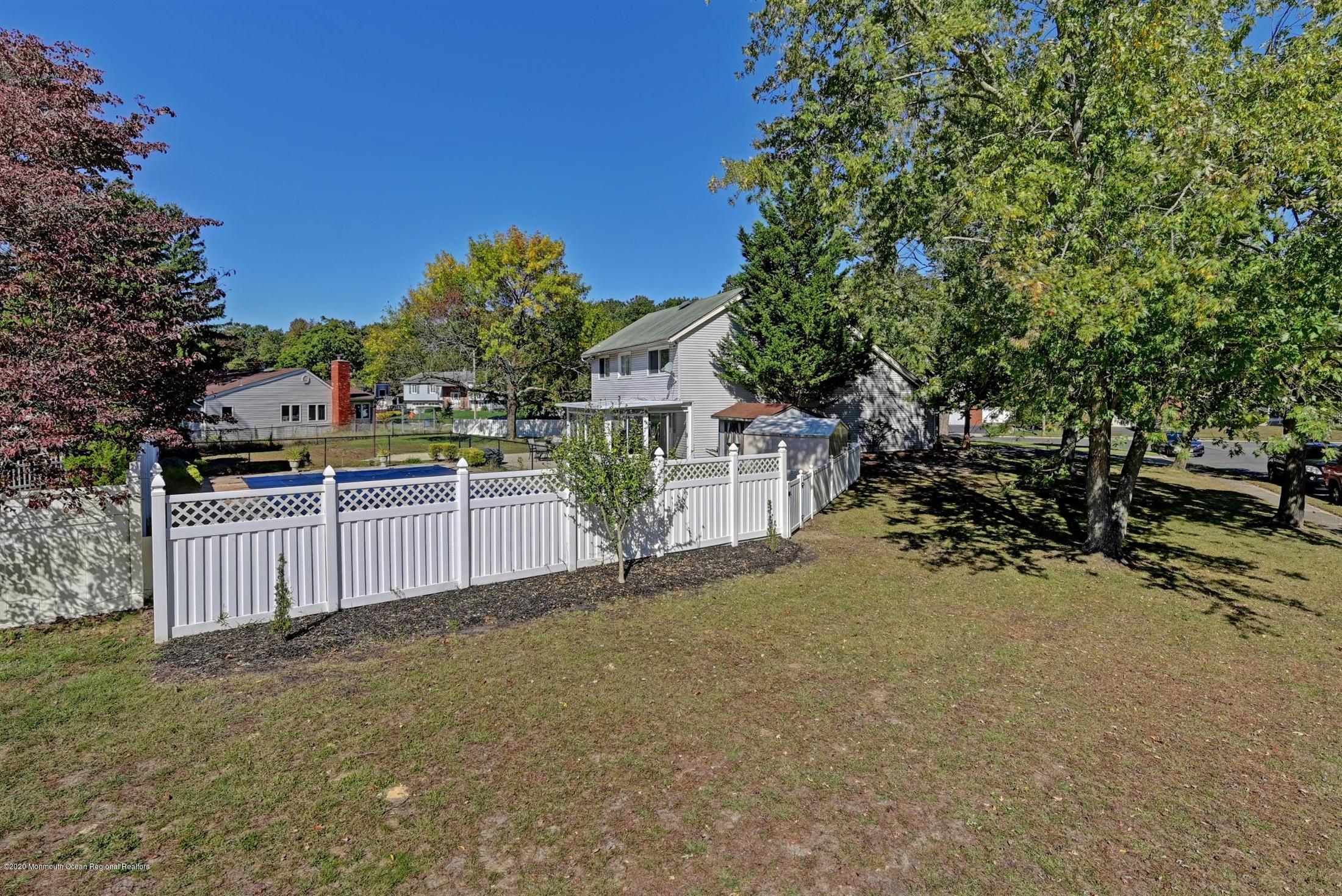 27 Sugar Bush Road Howell, NJ 07731 - Photo 45 of 46 a view of a house with a backyard