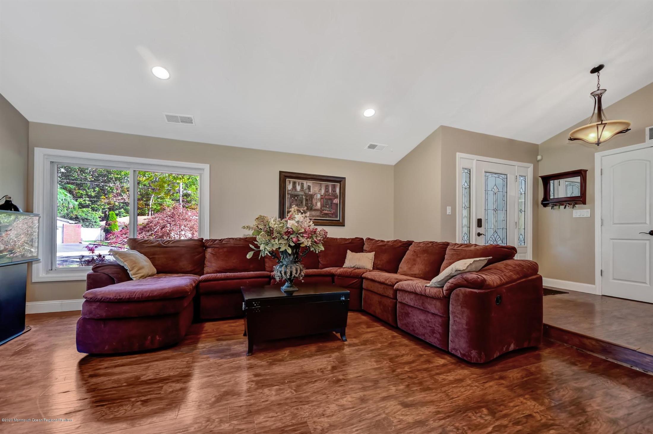 27 Sugar Bush Road Howell, NJ 07731 - Photo 9 of 46 a living room with furniture window and wooden floor