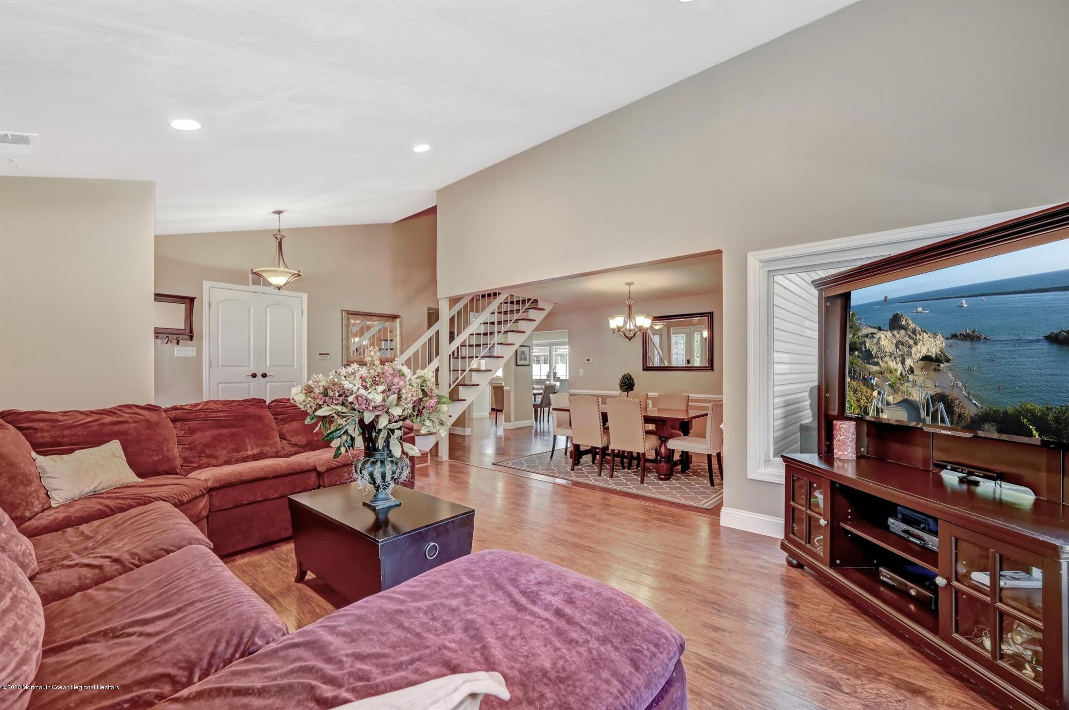 27 Sugar Bush Road Howell, NJ 07731 - Photo 10 of 46 a living room with furniture and wooden floor