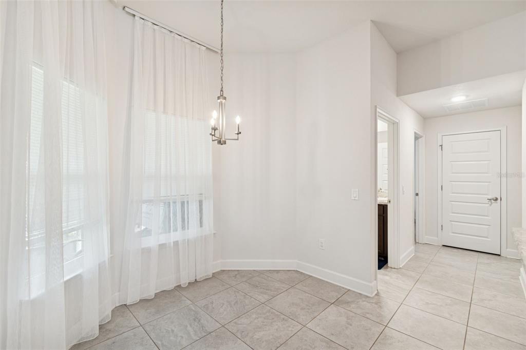 10358 Musa Road Spring Hill, FL 34608 - Photo 22 of 48 a view of an empty room with a window