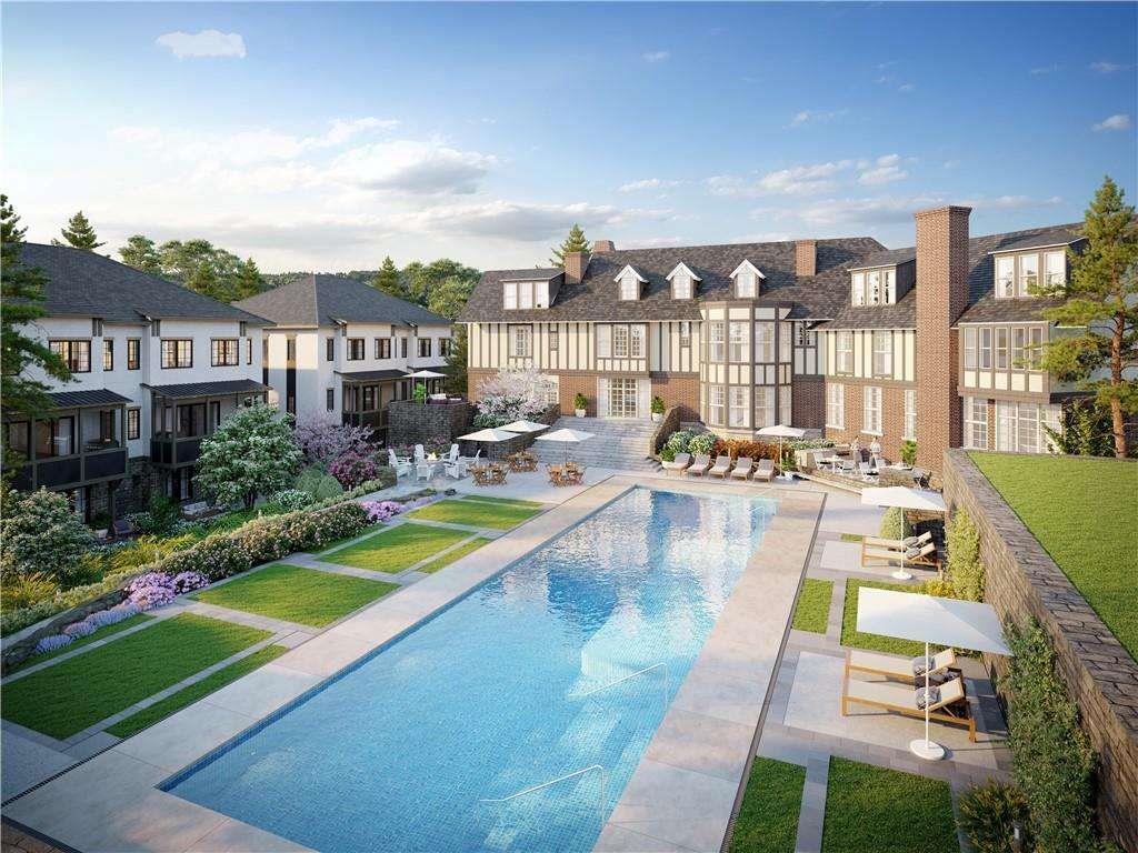 1585 South Ponce De Leon Avenue Northeast, Unit 13 Atlanta, GA 30307 - Photo 3 of 5 a view of a house with swimming pool and sitting area