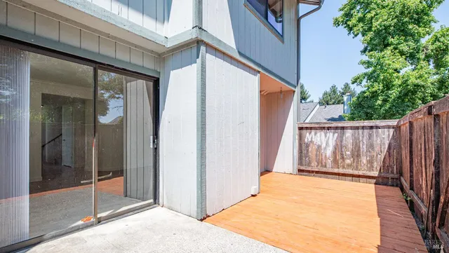 a view of a house with a yard and garage