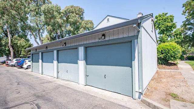 swimming pool with outdoor seating and yard